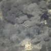 Khói bốc lên khi một mục tiêu của IS ở Syria bị không kích. (Nguồn: Reuters/TTXVN)