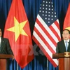 Chủ tịch nước Trần Đại Quang (bên phải) và Tổng thống Barack Obama tại cuộc họp báo. (Ảnh: Nhan Sáng/TTXVN) 