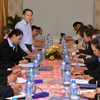 Đoàn hãng Thông tấn xã Lào (KPL) thăm và trao đổi nghiệp vụ với Báo Nghệ An. (Ảnh: Thanh Tùng/TTXVN) 