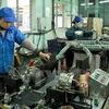 Dây chuyền sản xuất pin R20 của Công ty Cổ phần Pin Hà Nội (Tập đoàn Hóa chất Việt Nam). (Ảnh: Hoàng Hùng/TTXVN) 