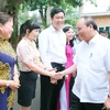 Thủ tướng Nguyễn Xuân Phúc với cán bộ Ban Chỉ đạo Tây Nguyên. (Ảnh: Thống Nhất/TTXVN)