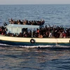 Người di cư bất hợp pháp tới Italy bằng đường biển. (Nguồn: ahram.org.eg)