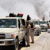 Binh sỹ thuộc lực lượng ủng hộ Chính phủ đoàn kết Libya làm nhiệm vụ tại thành phố Sirte ngày 10/6. (Nguồn: AFP/TTXVN)