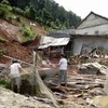 Một gia đình ở khu 3 thị trấn Trạm Tấu, huyện Trạm Tấu, tỉnh Yên Bái bị đất đá sạt lở vào nhà. (Ảnh: Tuấn Anh/TTXVN)