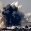 Khói bốc lên ở thị trấn Jarablus, Syria ngày 24/8. (Nguồn: AFP)