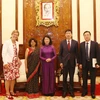 Phó Chủ tịch nước tiếp Trợ lý Tổng Thư ký Liên hợp quốc và Trưởng đại diện UNDP tại Việt Nam. (Ảnh: Phương Hoa/TTXVN)