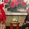 Thủ tướng Anh Theresa May và Tổng thống Nga Vladimir Putin. (Nguồn: BBC)