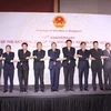 Đại sứ Nguyễn Tiến Minh cùng các đại sứ của các nước tại Singapore chụp ảnh lưu niệm. (Ảnh: Lê Hải/Vietnam+)