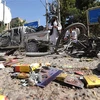 Hiện trường một vụ đánh bom tại khu chợ ở Afghanistan. (Nguồn: Telegraph)