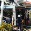Máy bay đâm vào trường học. (Nguồn: New Straits Times)
