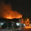 Đám cháy rừng tại tổ 8, khu 3, phường Hùng Thắng. (Ảnh: Nguyễn Hoàng/TTXVN)