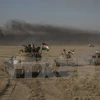 Các binh sỹ người Kurd làm nhiệm vụ trong chiến dịch chống IS tại Mosul, miền Bắc Iraq. (Nguồn: EPA/TTXVN)