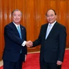 Thủ tướng Nguyễn Xuân Phúc tiếp ngài Yoichi Kobayashi - Chủ tịch Ủy ban Hợp tác Kinh tế Mekong-Nhật Bản thuộc Phòng Thương mại và Công nghiệp Nhật Bản. (Ảnh: Thống Nhất/TTXVN)