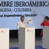 Tổng thống Colombia Juan Manuel Santos (giữa), Tổng thống Guatemala Jimmy Morales (trái) và Tổng thư ký Iberia-Mỹ Latinh Rebeca Gryspan tại hội nghị. (Nguồn: AP/TTXVN)