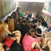 Chín người nước ngoài, trong đó có 7 phụ nữ Việt Nam, 1 phụ nữ Thái Lan và 1 người đàn ông Nepal bị bắt do vi phạm các quy định về nhập cư ở Malacca. (Nguồn: Nst.com.my) 