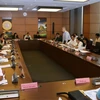 Đại biểu Quốc hội tỉnh Kon Tum, Gia Lai, Quảng Ninh, Quảng Ngãi thảo luận ở tổ. (Ảnh: Nguyễn Dân/TTXVN)