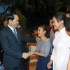 Chủ tịch nước Trần Đại Quang với cán bộ nhân viên Đại sứ quán, đại diện Cộng đồng người Việt Nam đang học tập, làm ăn và sinh sống tại Cuba. (Ảnh: Nhan Sáng/TTXVN)