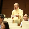 Hòa thượng Thích Chơn Thiện phát biểu tại một phiên họp của Quốc hội. (Ảnh: Phương Hoa/TTXVN)
