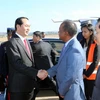 Các quan chức Chính phủ Madagascar cùng Ban tổ chức Hội nghị đón Chủ tịch nước Trần Đại Quang và Phu nhân tại sân bay quốc tế Ivato. (Ảnh: Nhan Sáng/TTXVN)