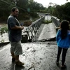 Một cây cầu bị hư hại vì bão Otto. (Nguồn: Reuters)