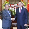 Chủ tịch nước Trần Đại Quang tiếp ông Datuk Seri Mustapa Mohamed, Bộ trưởng Ngoại thương và Công nghiệp Malaysia đang thăm và làm việc tại Việt Nam. (Ảnh: Nhan Sáng/TTXVN)