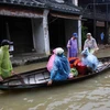 Nhiều nhà dân ở phố cổ Hội An, Quảng Nam bị chìm ngập trong nước lũ. (Ảnh: Trần Lê Lâm/TTXVN)