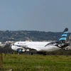 Máy bay Airbus A320 của hãng hàng không Afriqiyah Airways tại sân bay Luqa, ở Malta ngày 23/12. (Nguồn: AFP/TTXVN)