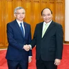 Thủ tướng Nguyễn Xuân Phúc tiếp ông Sommad Pholsena, Bộ trưởng Tài nguyên và Môi trường Lào đang thăm và làm việc tại Việt Nam. (Ảnh: Thống Nhất/TTXVN)