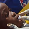 Uống vắcxin phòng dịch tả ở Tanzania. (Nguồn: UNHCR)