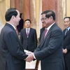  Chủ tịch nước Trần Đại Quang tiếp Ngài Sar Kheng, Phó Thủ tướng, Bộ trưởng Bộ Nội vụ Vương quốc Campuchia. (Ảnh: Nhan Sáng/TTXVN)