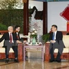 Tổng Bí thư, Chủ tịch Trung Quốc Tập Cận Bình chào mừng Tổng Bí thư Nguyễn Phú Trọng. (Ảnh: Trí Dũng/TTXVN)