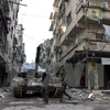 Binh sỹ quân đội Chính phủ Syria sau khi giành lại quyền kiểm soát thành phố Aleppo ngày 23/12/2016. (Nguồn: EPA/TTXVN)
