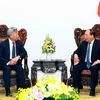 Thủ tướng Nguyễn Xuân Phúc tiếp ông Kim Lập Quần, Chủ tịch Ngân hàng Đầu tư Cơ sở hạ tầng châu Á (AIIB). (Ảnh: Thống Nhất/TTXVN)