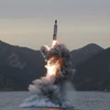 Tên lửa đạn đạo từng được phóng lên từ tàu ngầm tại một vị trí bí mật ở Triều Tiên. (Nguồn: EPA/TTXVN)