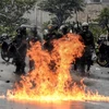 Lực lượng an ninh được triển khai tại khu vực có người biểu tình ở Venezuela. (Nguồn: AFP)
