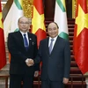Thủ tướng Nguyễn Xuân Phúc tiếp Chủ tịch Thượng viện kiêm Chủ tịch Quốc hội Myanmar Mahn Win Khaing Than đang ở thăm chính thức Việt Nam. (Ảnh: Thống Nhất/TTXVN)