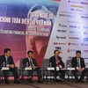 Các diễn giả chủ trì phiên thảo luận Diễn đàn Banking VIET NAM 2017. (Ảnh: Hoàng Hải/TTXVN)