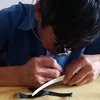 Ông Perrin-Văn Phúc, người thợ từng sửa đồng hồ của Chủ tịch Hồ Chí Minh. (Ảnh: Nguyễn Duy Thái/Vietnam+)