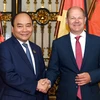 Thủ tướng Chính phủ Nguyễn Xuân Phúc và Thủ hiến kiêm Thị trưởng bang Hamburg Olaf Scholz. (Nguồn: Chinhphu.vn)