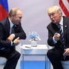 Tổng thống Nga Vladimir Putin và người đồng cấp Mỹ Donald Trump. (Nguồn: AFP)