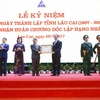 hủ tịch nước Trần Đại Quang trao tặng Huân chương Độc lập hạng Nhất cho tỉnh Lào Cai. (Ảnh: An Đăng/TTXVN)