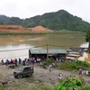 Thủy điện Tuyên Quang xả lũ khiến hơn 70 tấn cá bị nước cuốn trôi. (Nguồn: TTXVN)