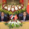 Chủ tịch nước Trần Đại Quang và Tổng thống Ai Cập Abdel Fattah el-Sisi chủ trì họp báo, thông báo kết quả hội đàm. (Ảnh: Nhan Sáng/TTXVN)