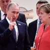 Tổng thống Nga Vladimir Putin và Thủ tướng Đức Angela Merkel trong một cuộc gặp. (Nguồn: Reuters)