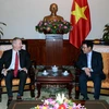 Phó Thủ tướng, Bộ trưởng Bộ Ngoại giao Phạm Bình Minh tiếp Đại sứ Hoa Kỳ tại Việt Nam Ted Osius. (Ảnh: Phạm Kiên/TTXVN)