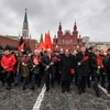 Các thành viên Đảng Cộng sản Nga tại lễ kỷ niệm 100 năm Cách mạng Tháng Mười Nga ở thủ đô Moskva. (Nguồn: AFP/TTXVN)