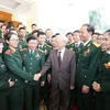 Tổng Bí thư Nguyễn Phú Trọng, Bí thư Quân ủy Trung ương với các đại biểu Thanh niên Quân đội. (Ảnh: Trí Dũng/TTXVN)