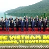 Chủ tịch nước Trần Đại Quang và các Trưởng đoàn các nền kinh tế thành viên APEC chụp ảnh chung. (Ảnh: TTXVN) 