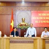 Thủ tướng Nguyễn Xuân Phúc làm việc với lãnh đạo hai tỉnh Khánh Hoà, Phú Yên về công tác khắc phục hậu quả cơn bão số 12 và hoàn lưu cơn bão số 14. (Ảnh: Thống Nhất/TTXVN)