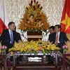 Chủ tịch Ủy ban Nhân dân Thành phố Hồ Chí Minh Nguyễn Thành Phong tiếp Tổng thống Cộng hòa Ba Lan Andrzej Duda và Phu nhân đang trong chuyến thăm cấp Nhà nước tại Việt Nam. (Ảnh: Thanh Vũ/TTXVN)